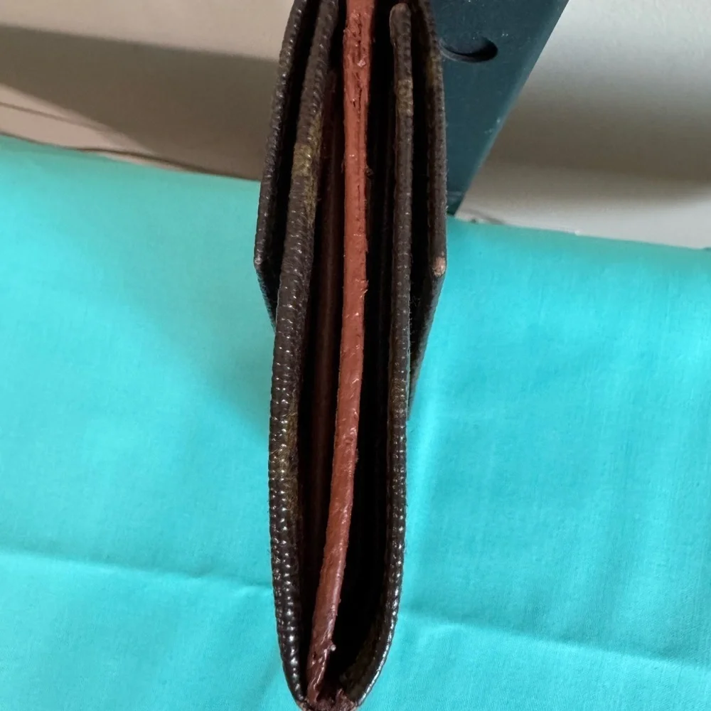 Louis Vuitton Double. Snap Monogram Wallet